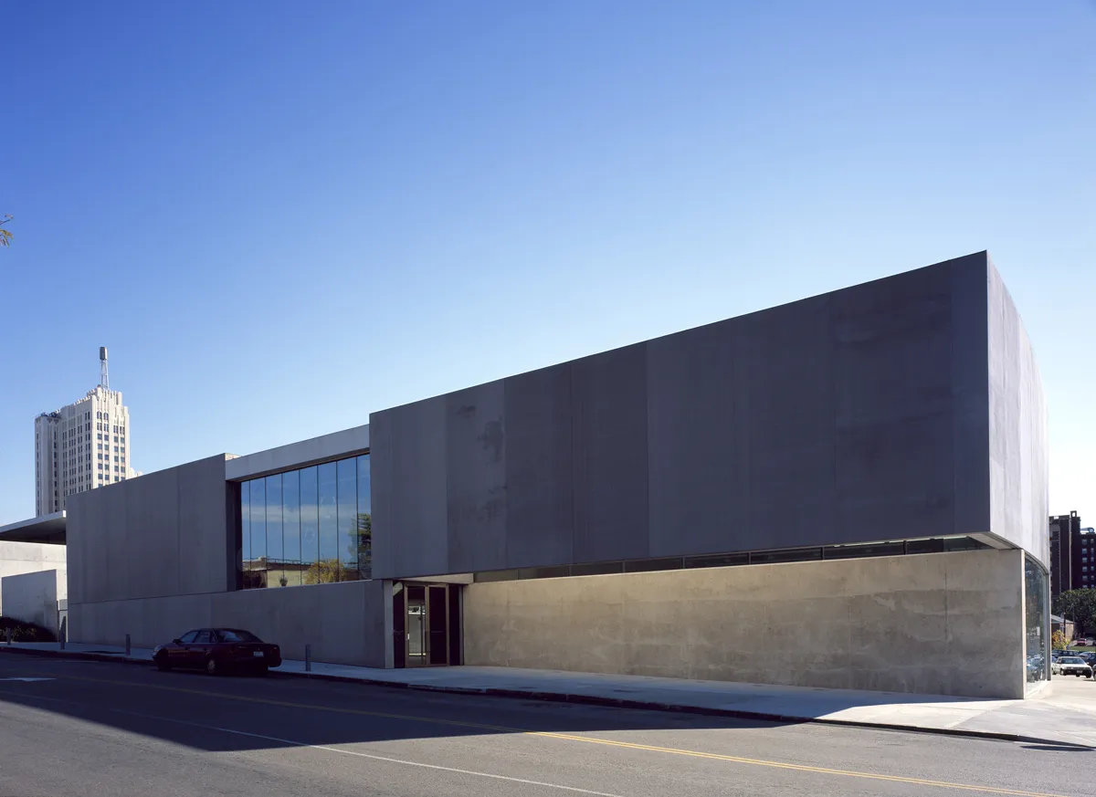 Exterior of a contemporary dark-paneled commercial building