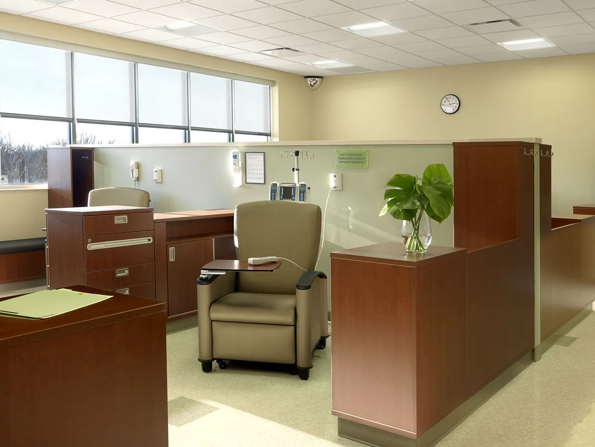 Comfortable seating for infusion center with bright windows