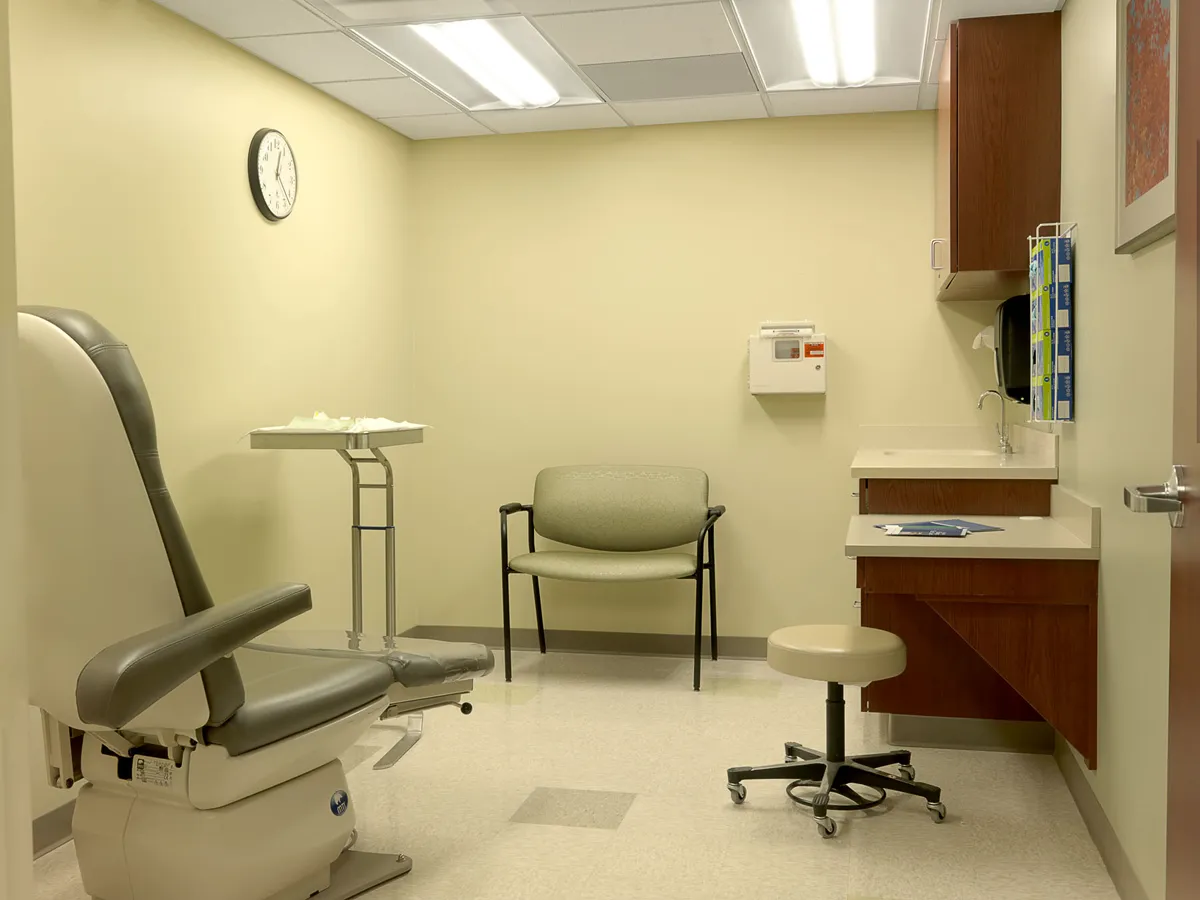 Clinical exam room or consultation space with neutral finishes