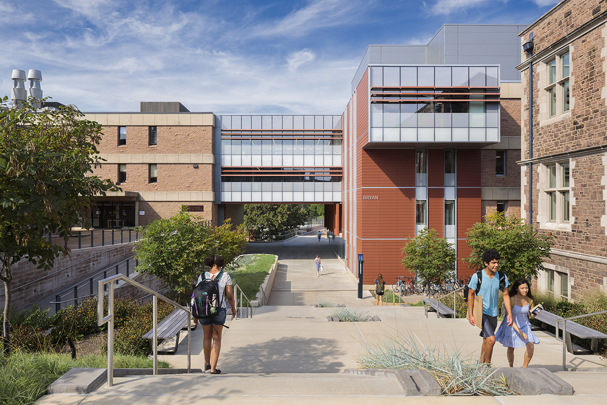 Students walk in front of the Washington University Bryan Hall plaza