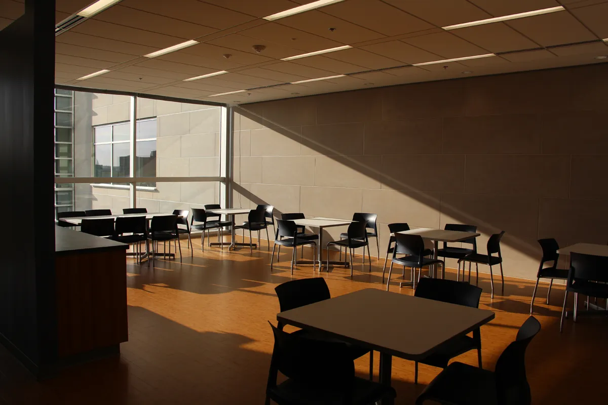 Open office or workroom with multiple desks and task lighting