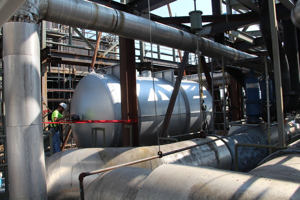 man working on power plant equipment
