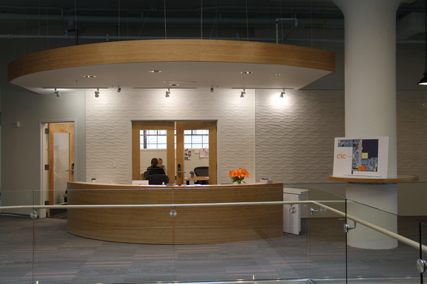 Interior view of a commercial space under renovation with drywall and open ceiling