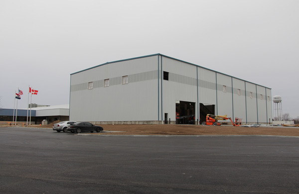 Exterior view of a large metal warehouse or industrial building