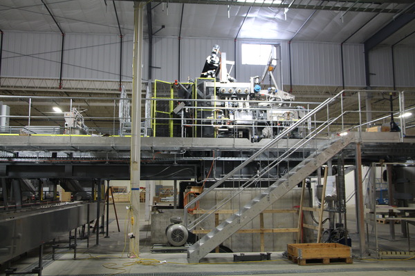 Industrial scaffolding and steel framework inside a building under construction