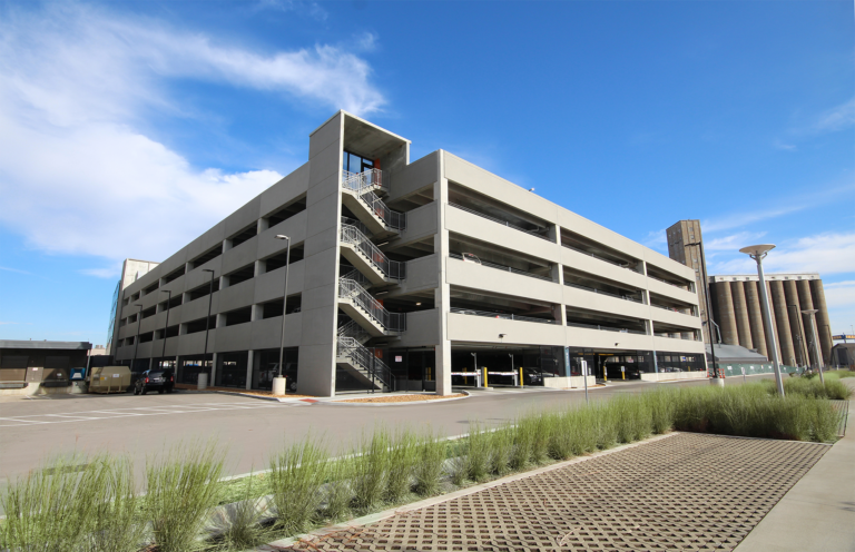 Exterior corner view of a multi-story parking garage