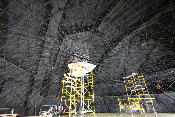 Close-up of a concrete tunnel or underground structure with scaffolding