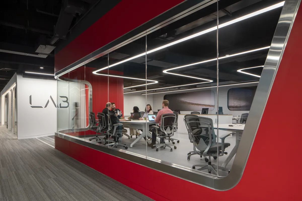 Bold red and black retail or commercial interior with open display area
