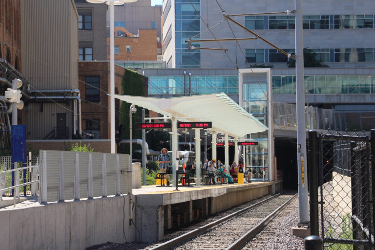 Close-up of a covered outdoor walkway or transit shelter under construction
