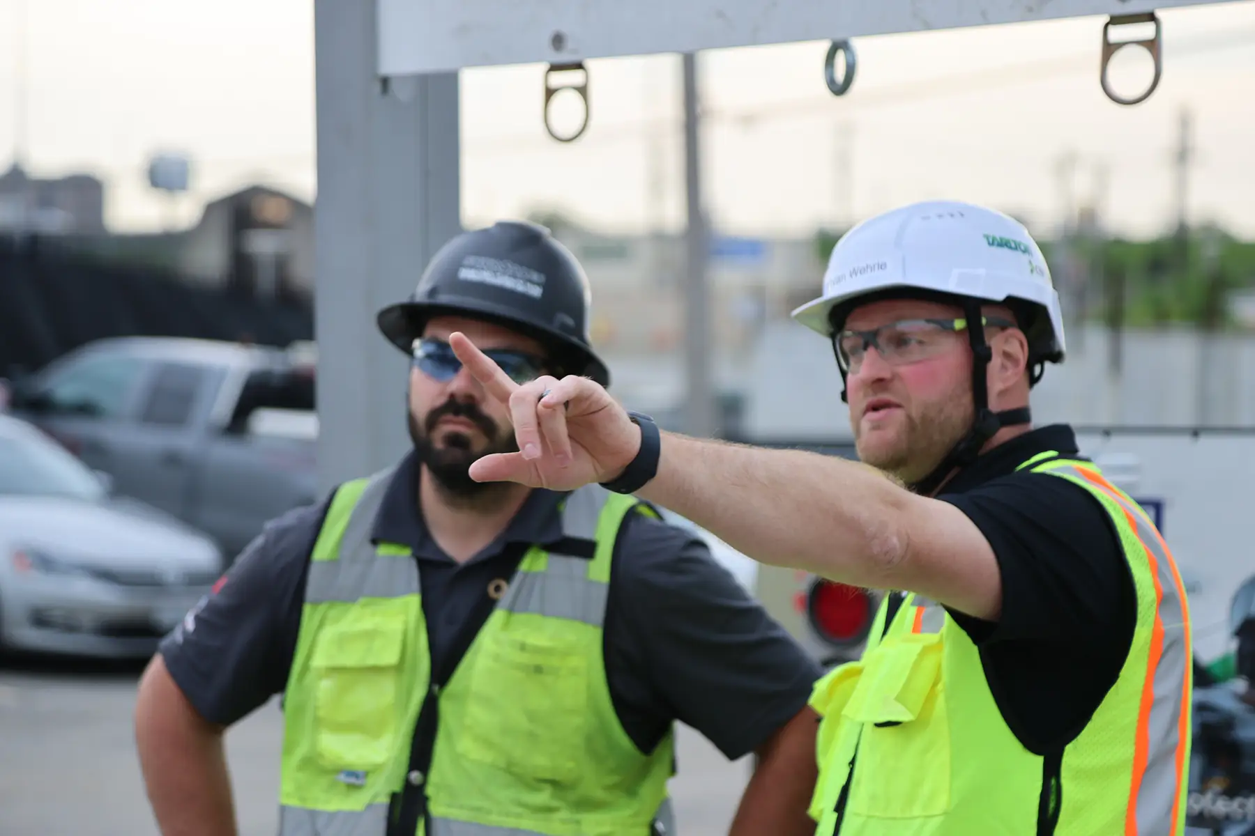 Tarlton employees discussing safety plan