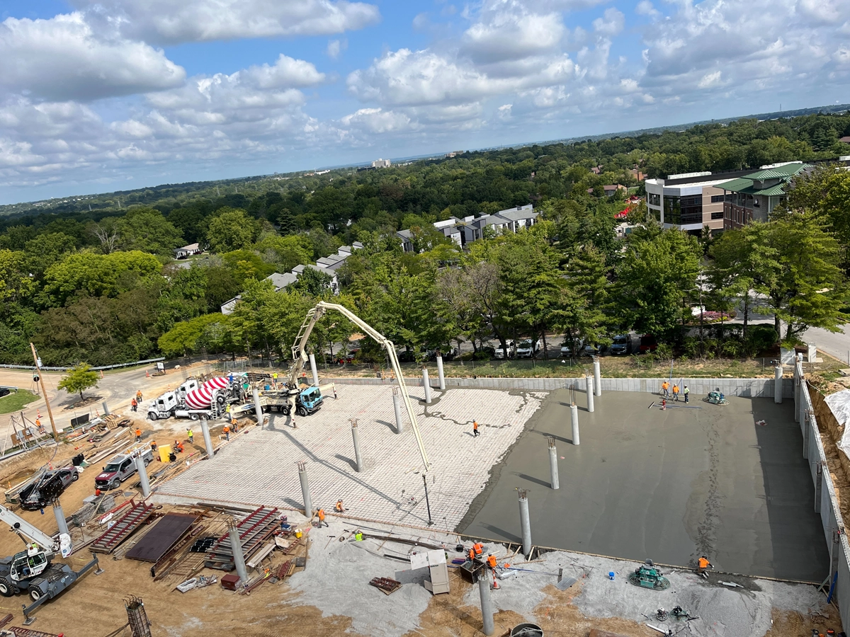 Pouring concrete at outdoor construction site