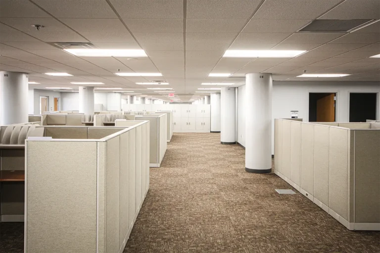 Open commercial or office space under renovation with neutral finishes