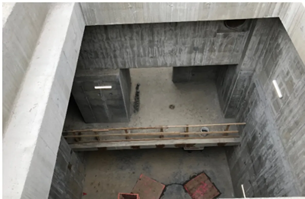 Concrete block wall construction inside a building under renovation