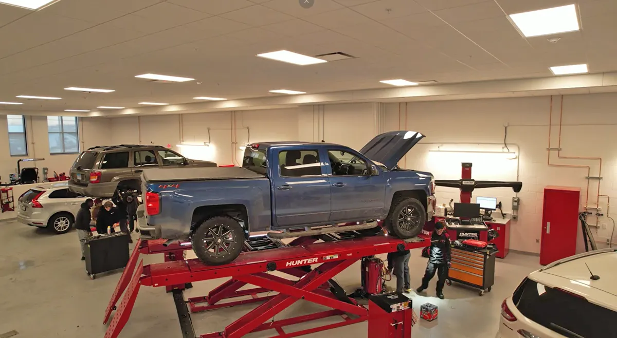 Auto service or retail facility interior with lifts and open floor plan