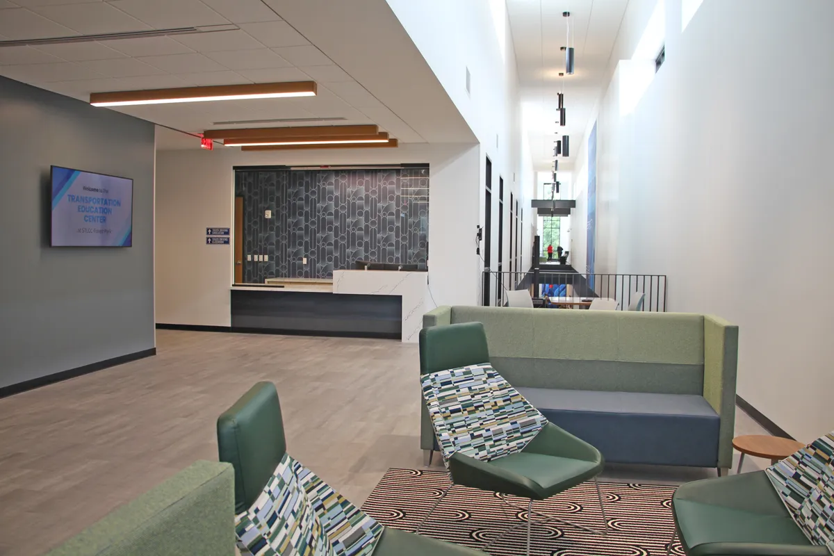Modern lobby or reception area with wood wall panels and open layout