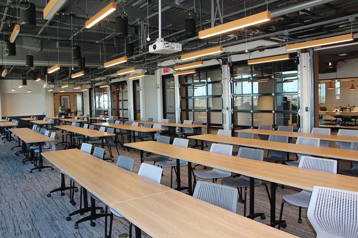 Open office or educational space with workstations and large windows