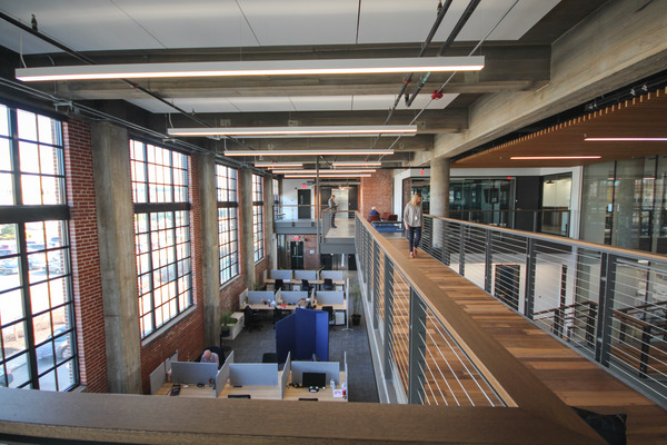 Modern interior with exposed steel structure and large windows