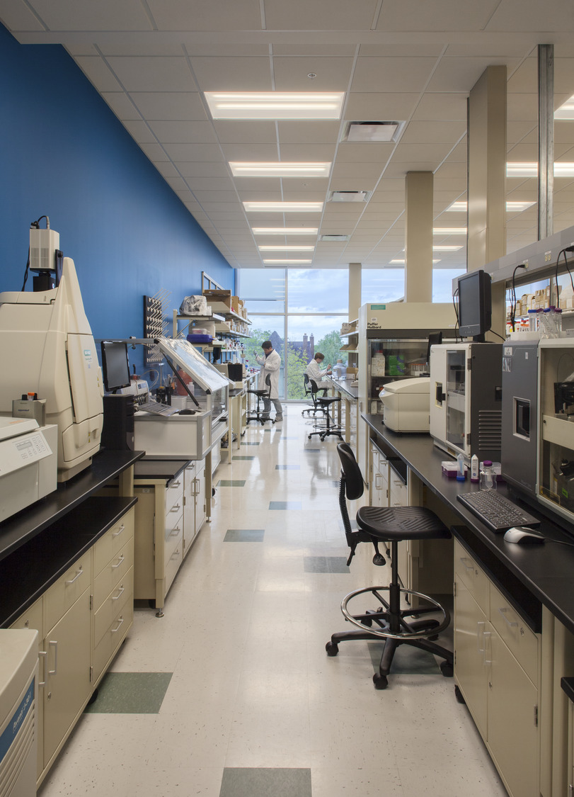 Laboratory or technical workspace with equipment and large windows