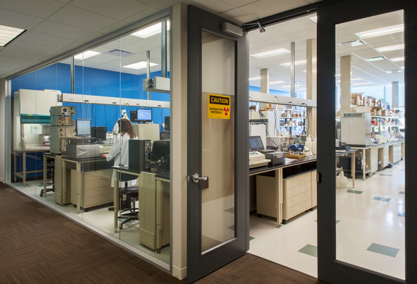 Open door to modern lab with medical equipment