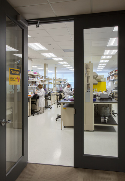 Open door to modern lab with medical equipment