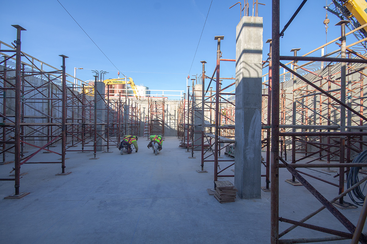 Steel scaffolding and vertical framework rising at a construction site