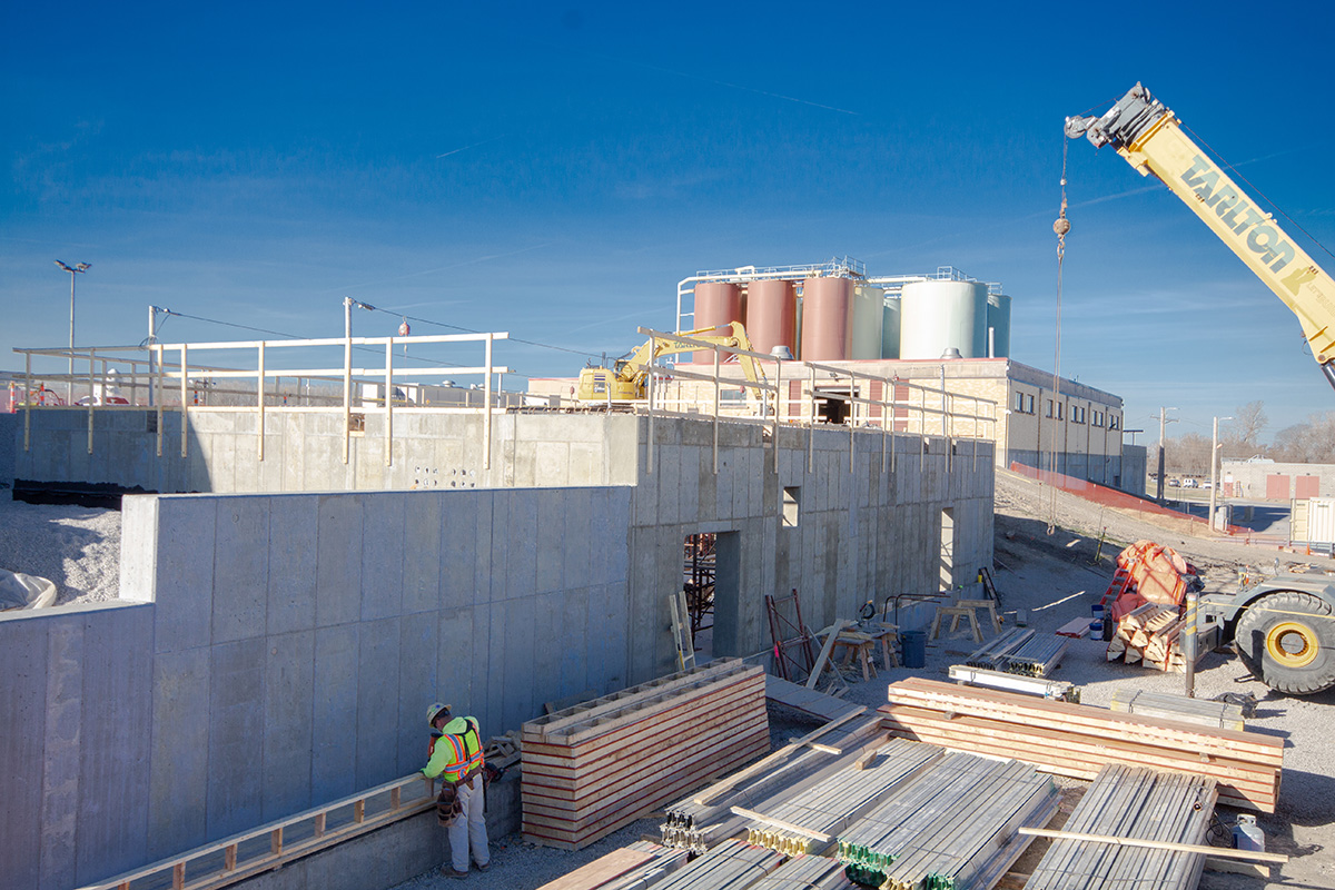 Aerial view of a concrete foundation and site work under construction