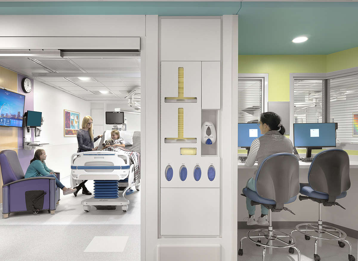 Hospital corridor with medical staff and patient care equipment