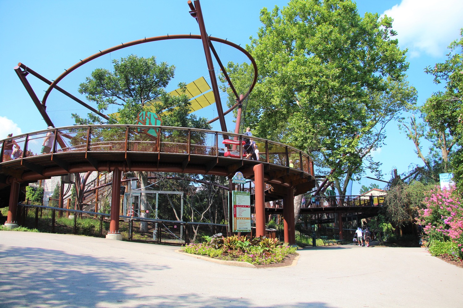 Outdoor adventure playground or nature play area with climbing structures