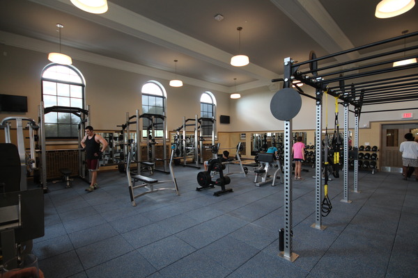 Open gym or fitness facility interior with exercise equipment